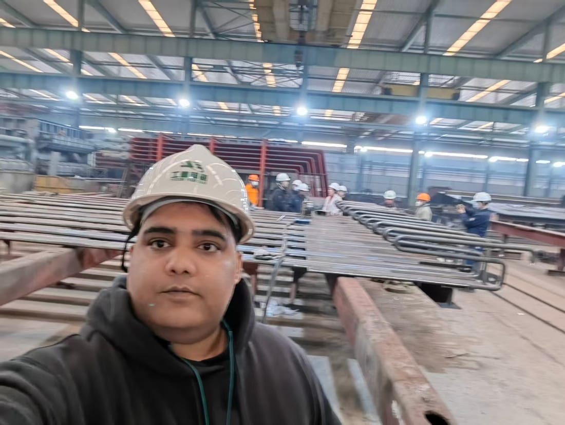 Stacked steel beams on the production floor