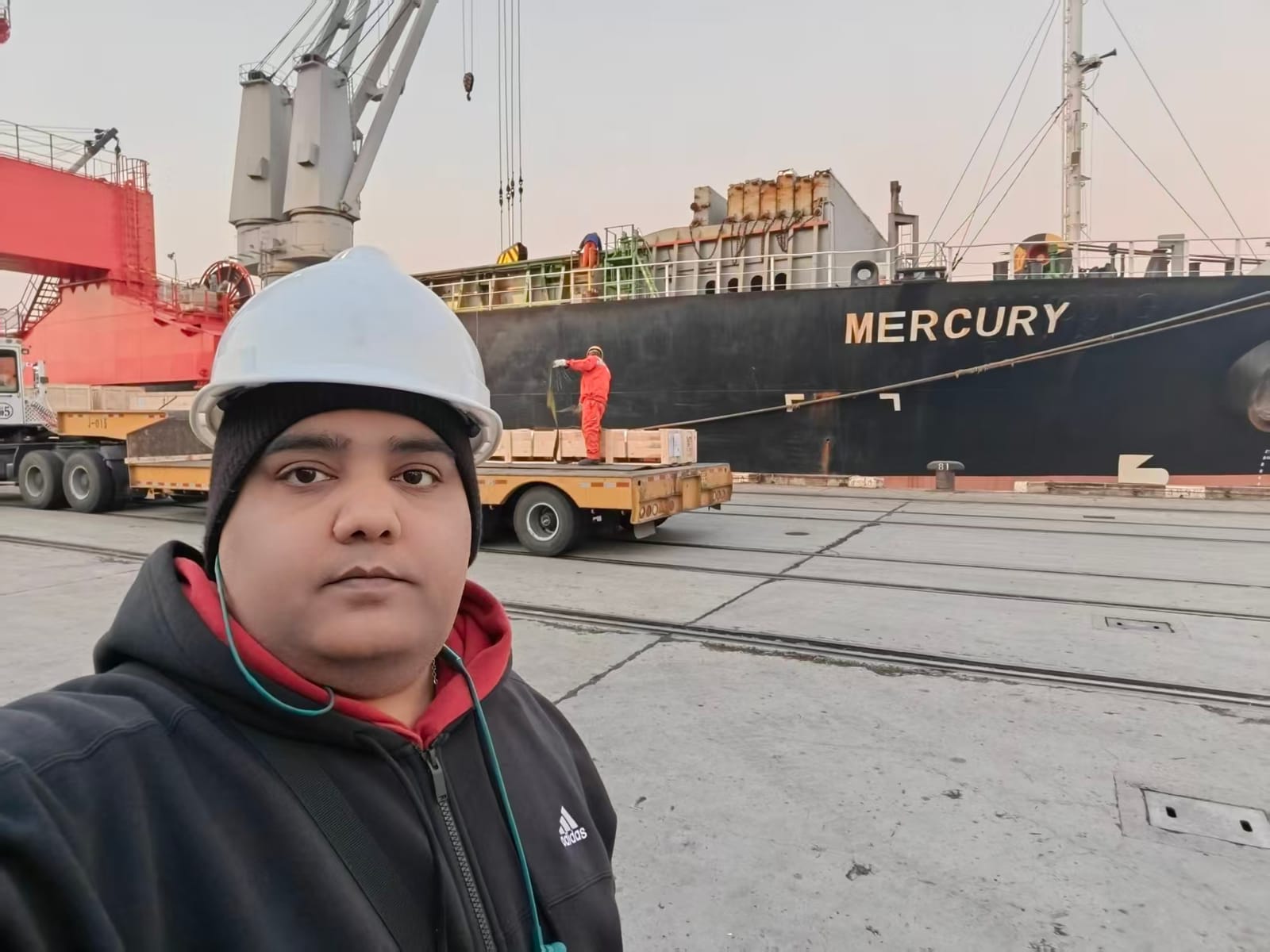The cargo vessel MERCURY loading at a Chinese port during a CXRT Co. logistics visit